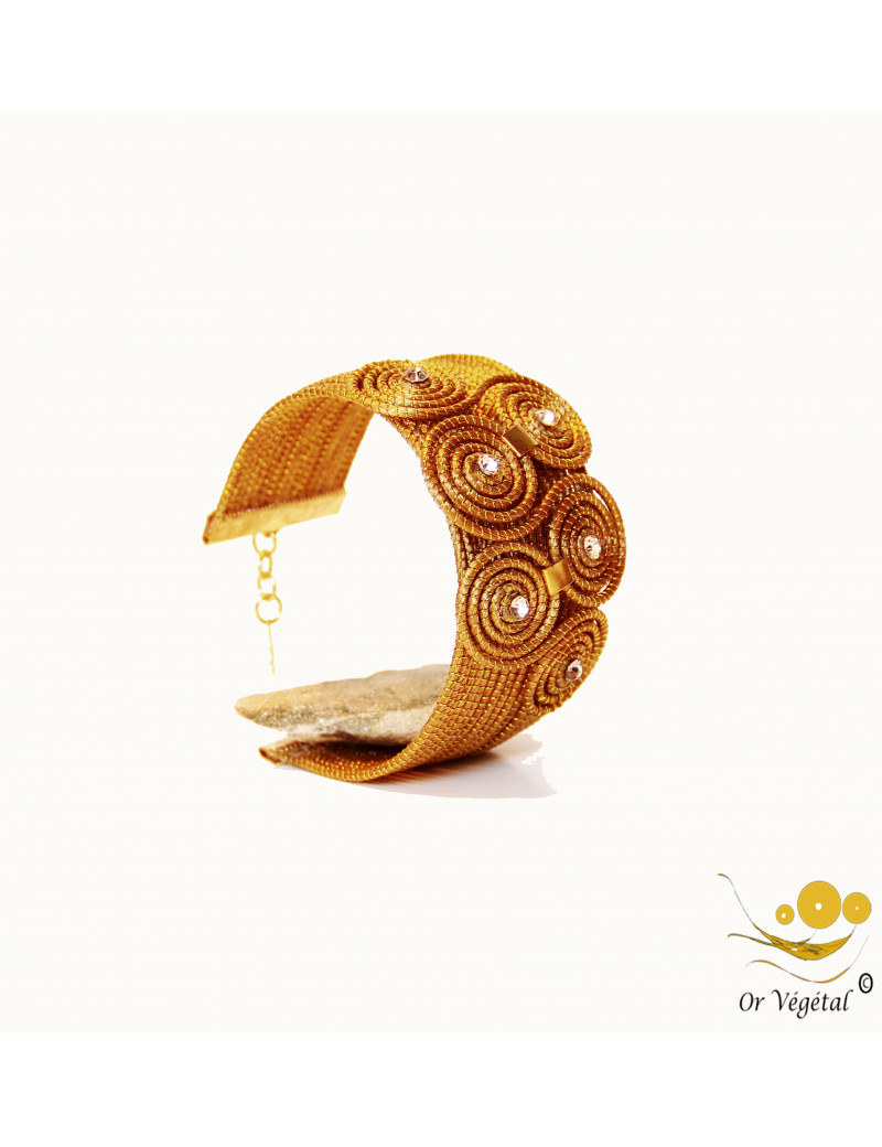 Bracelet en or végétal cerclés avec une forme de double triskel